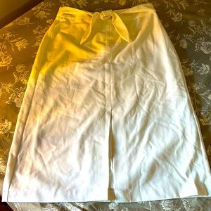 Ivory front slit skirt.